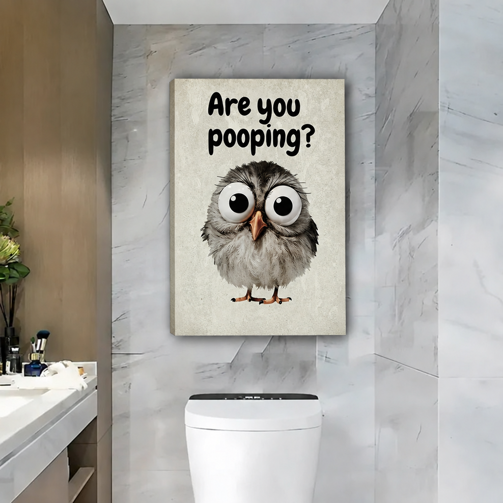 Unframed gallery-wrap are you pooping owl canvas wall art displayed on a marble bathroom wall above the toilet.