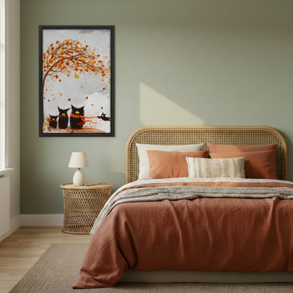  Framed autumn black cats canvas beside a rattan bed.