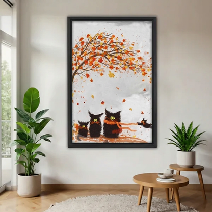 Framed autumn black cats canvas beside indoor plants.

