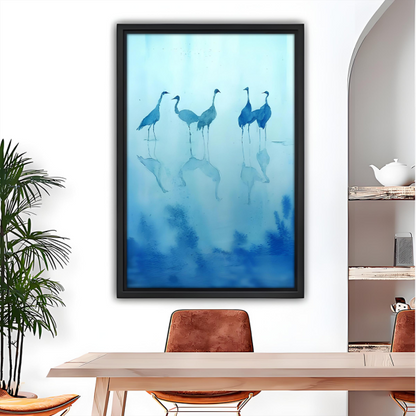 Blue crane watercolor reflection framed canvas wall art, black frame, five cranes in misty water, dining room wall decor above wooden table with leather chairs