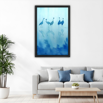 Blue crane watercolor framed canvas wall art, black frame, serene bird reflection print, living room decor above gray sofa with blue cushions
