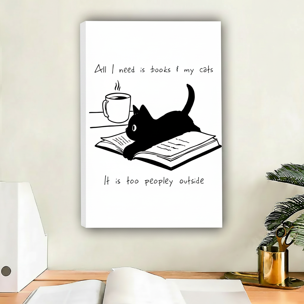 Black cat books quote framed wall art hanging above home office desk with plant