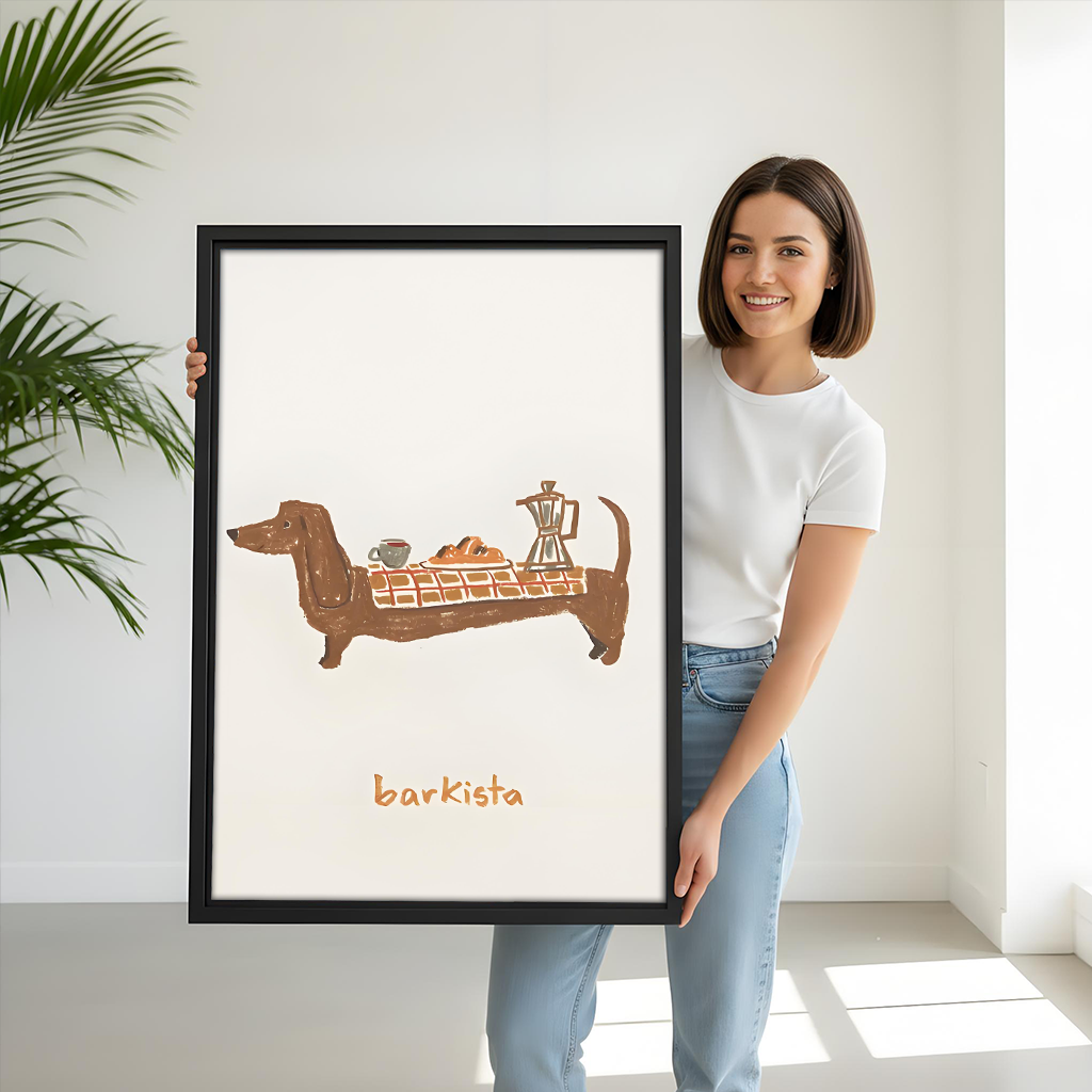 Woman holding black-framed dachshund coffee canvas wall art with barkista lettering and a whimsical café illustration on cream.