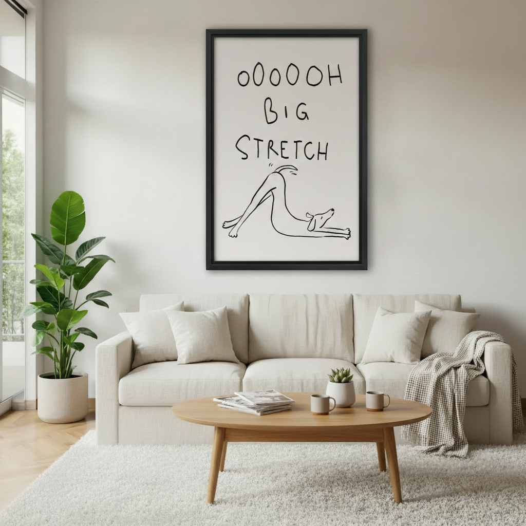 Framed minimalist line art print of dog doing big stretch with handwritten text, displayed above white sofa in bright modern living room