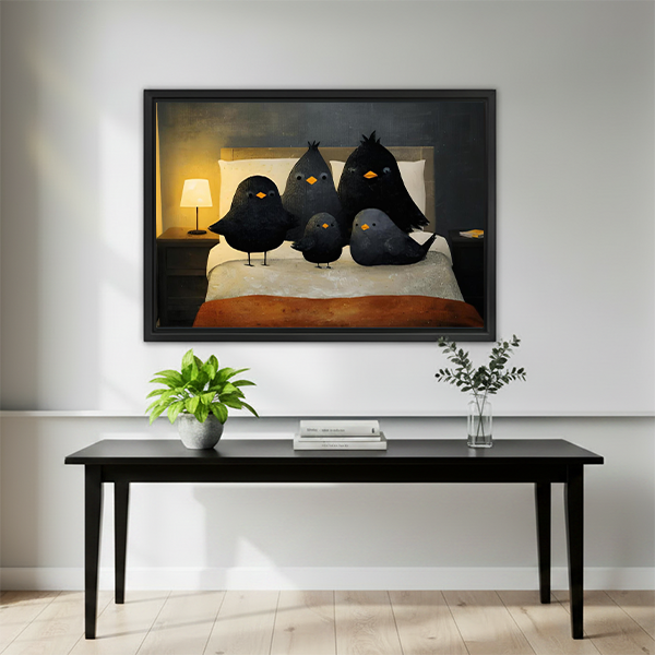 Woman holding a large framed black birds on a bed canvas wall art to show its horizontal size