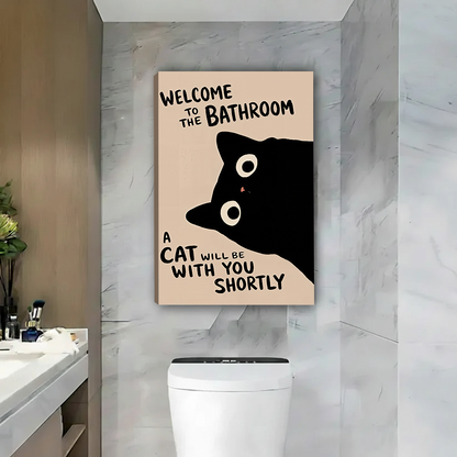 Gallery-wrap black cat bathroom canvas wall art featuring playful lettering and a peach background above a toilet.