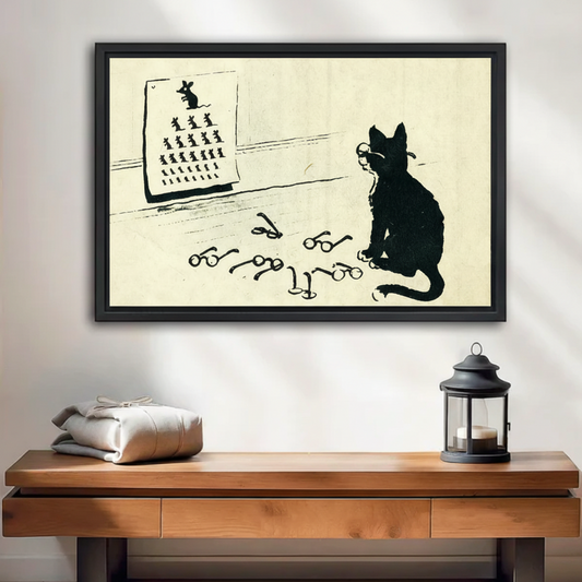Framed black cat eye chart vintage canvas print displayed above a wooden console table with lantern decor