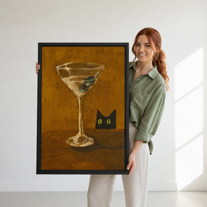  Woman holding framed black cat and martini canvas wall art.