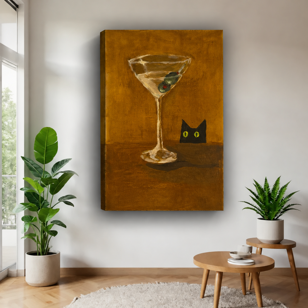 Unframed black cat and martini canvas with olives against an ochre background.