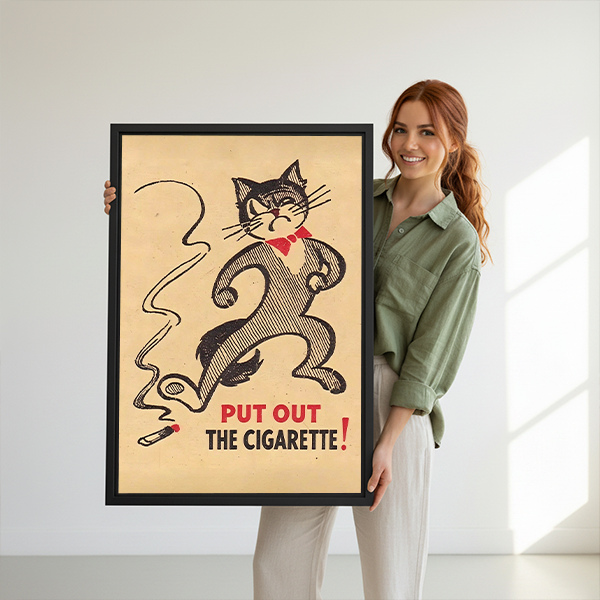 Black framed retro black cat no smoking canvas wall art with English lettering between plants above wooden tables.