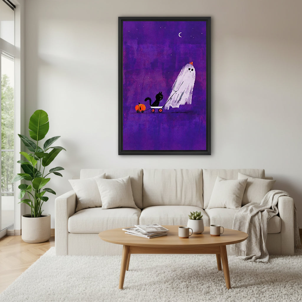Halloween ghost pumpkin hat black cat orange pumpkin cart purple crescent moon sky black framed canvas wall art above wide cream linen sofa with oval wood coffee table knit throw and succulent