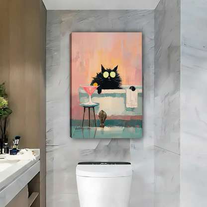 Framed black cat spa canvas wall art featuring a pastel bathtub displayed beside a round mirror and wooden vanity.