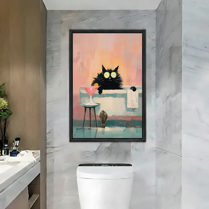 Gallery-wrap black cat spa canvas wall art with cucumber eye masks and a pink cocktail above a bathroom toilet.