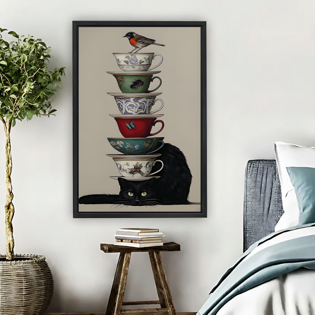 Black cat balancing colorful stacked teacups with robin bird on top framed canvas print displayed in cozy bedroom