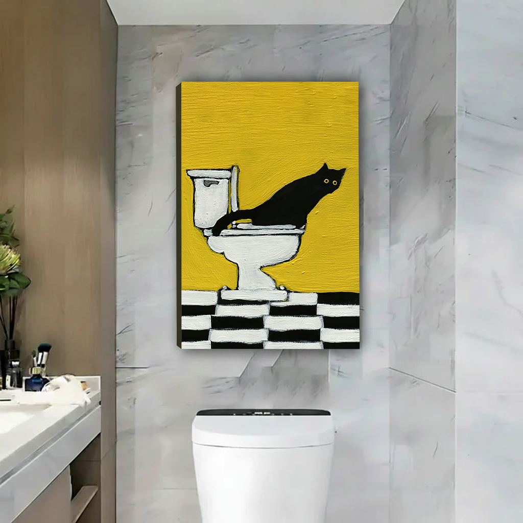 Black cat on toilet canvas wall art in a black frame above a toilet against gray marble walls.