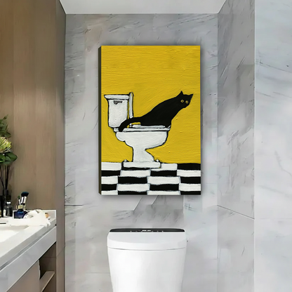 Black cat on toilet canvas wall art in a black frame above a toilet against gray marble walls.