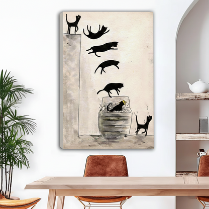 Frameless gallery-wrap canvas of a humorous ink sketch showing seven black cat silhouettes in sequence leaping off a ledge and diving one by one into a trash can, with a startled cat running away beside it, displayed above a light wood dining table with tan leather chairs