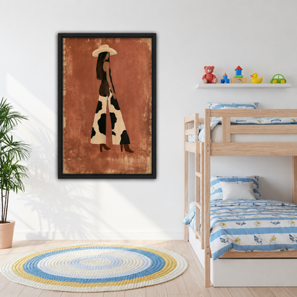 Framed canvas of minimalist western cowgirl in wide-brim hat and cow print maxi skirt with brown boots on terracotta textured background on white wall beside bunk bed with blue striped bedding