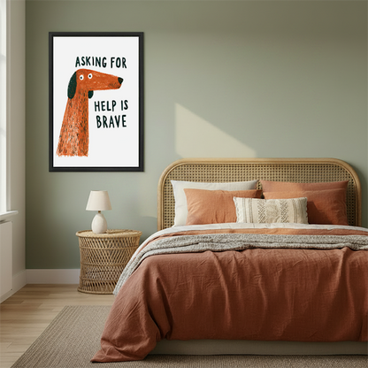 Black framed brave dog quote canvas wall art on a white background displayed above a cream living room sofa.