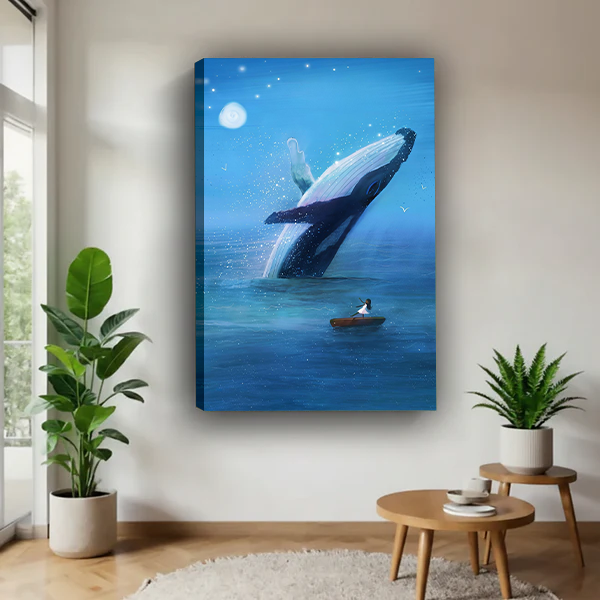 Gallery-wrap breaching whale canvas wall art showing a tiny boat beneath a moonlit sky, displayed between potted plants.