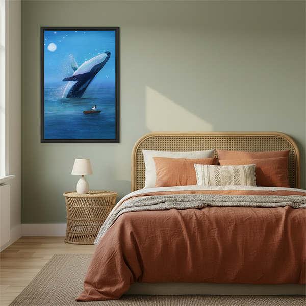Woman holding framed breaching whale canvas wall art featuring a giant whale, tiny boat, and glowing moon.