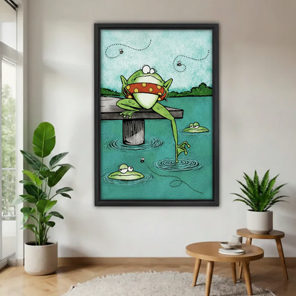 Cartoon frog on dock framed canvas wall art hung on white wall in minimalist room with indoor plants and round side table