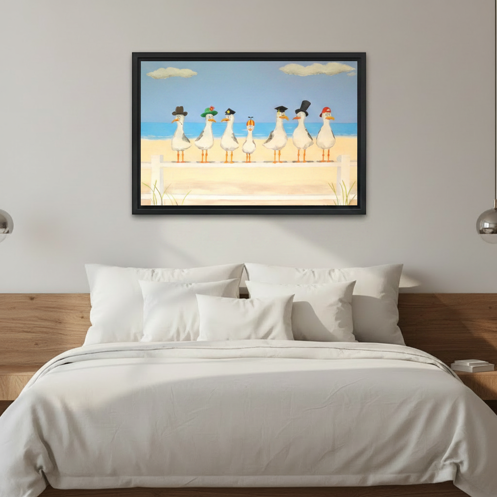  Seven cartoon seagulls in hats framed wall art above white bed, playful beach theme bedroom decor