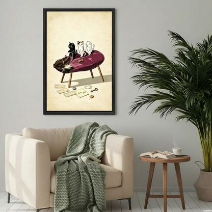 Whimsical cat adventure canvas wall art with black frame hanging above beige armchair in cozy living room