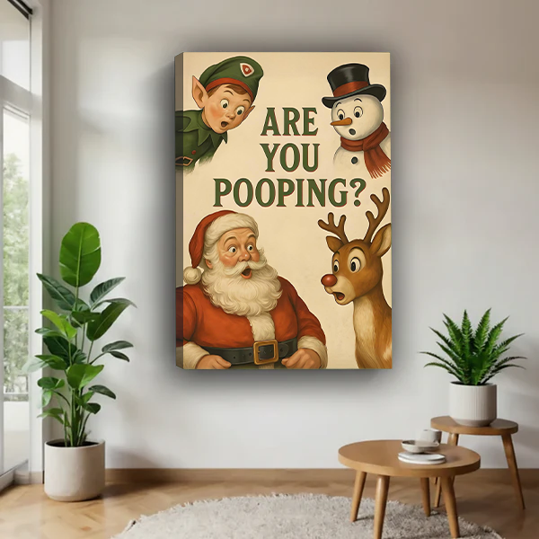 Framed vintage Christmas bathroom canvas wall art with Santa and festive characters displayed between green houseplants.
