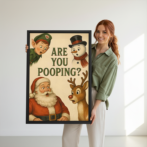 Christmas bathroom canvas wall art with humorous lettering in a black frame beside a rattan bed and terracotta bedding.