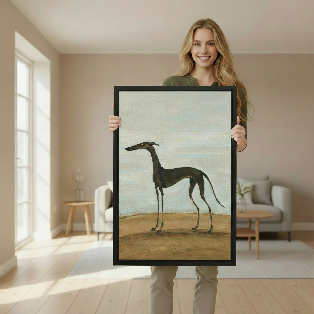 Smiling woman holding large black framed classical oil greyhound portrait canvas wall art in bright living room
