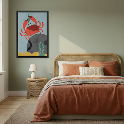 Black-framed coastal crab canvas wall art beside leafy plants and wooden tables in a bright sitting area.