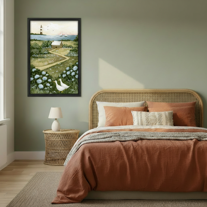 Framed coastal lighthouse goose canvas wall art displayed above a warm-toned bedroom.