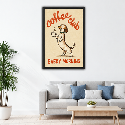 Coffee Club dog canvas wall art in a black frame above a light sofa with blue pillows.