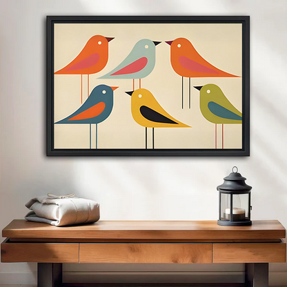 Framed colorful birds canvas wall art with six mid-century silhouettes above a bed with white bedding.