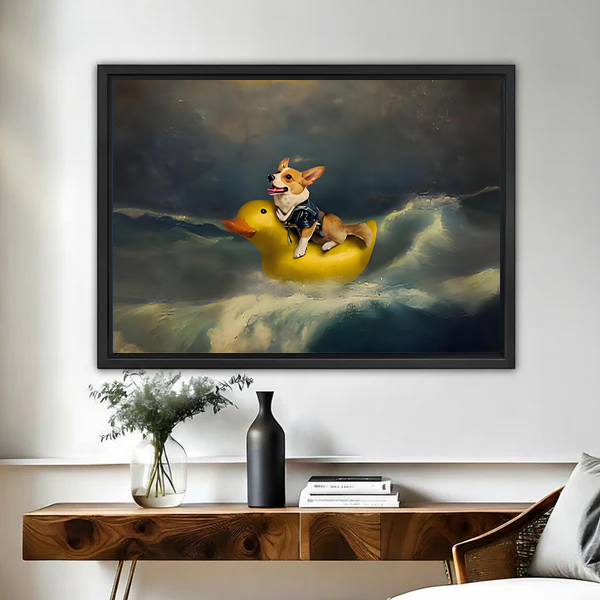 Funny corgi riding yellow rubber duck in stormy ocean framed canvas wall art in black float frame above wooden console