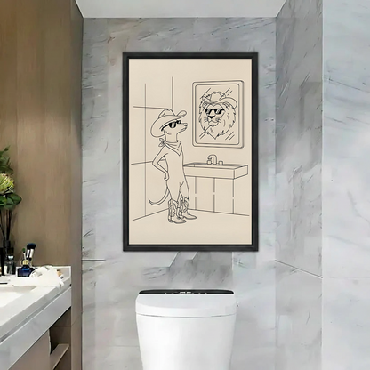Framed cowboy mouse canvas wall art above a toilet shows a little mouse seeing a lion in the mirror.
