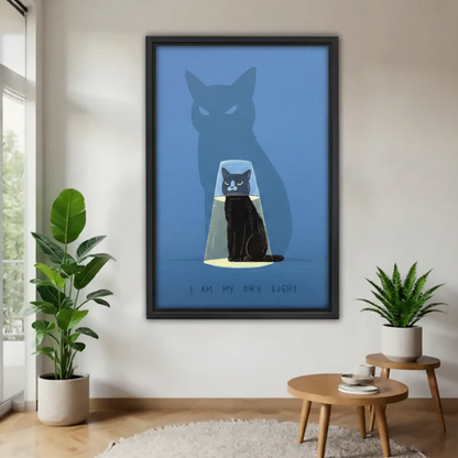Black cat empowerment framed canvas wall art with quote 'I Am My Own Light' displayed in a modern living room