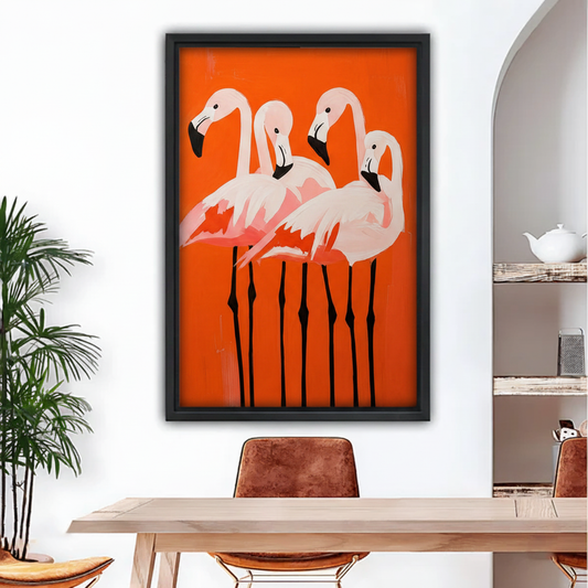 Bold pink flamingo modern art framed canvas wall print hanging above dining table in stylish home