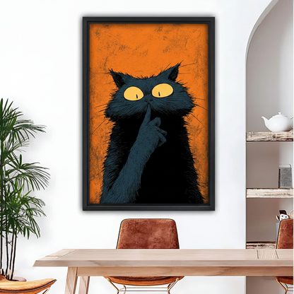 Funny shushing black cat pop art framed canvas wall art, black frame, bold yellow-eyed cat with finger to lips on orange background, displayed in a modern dining room