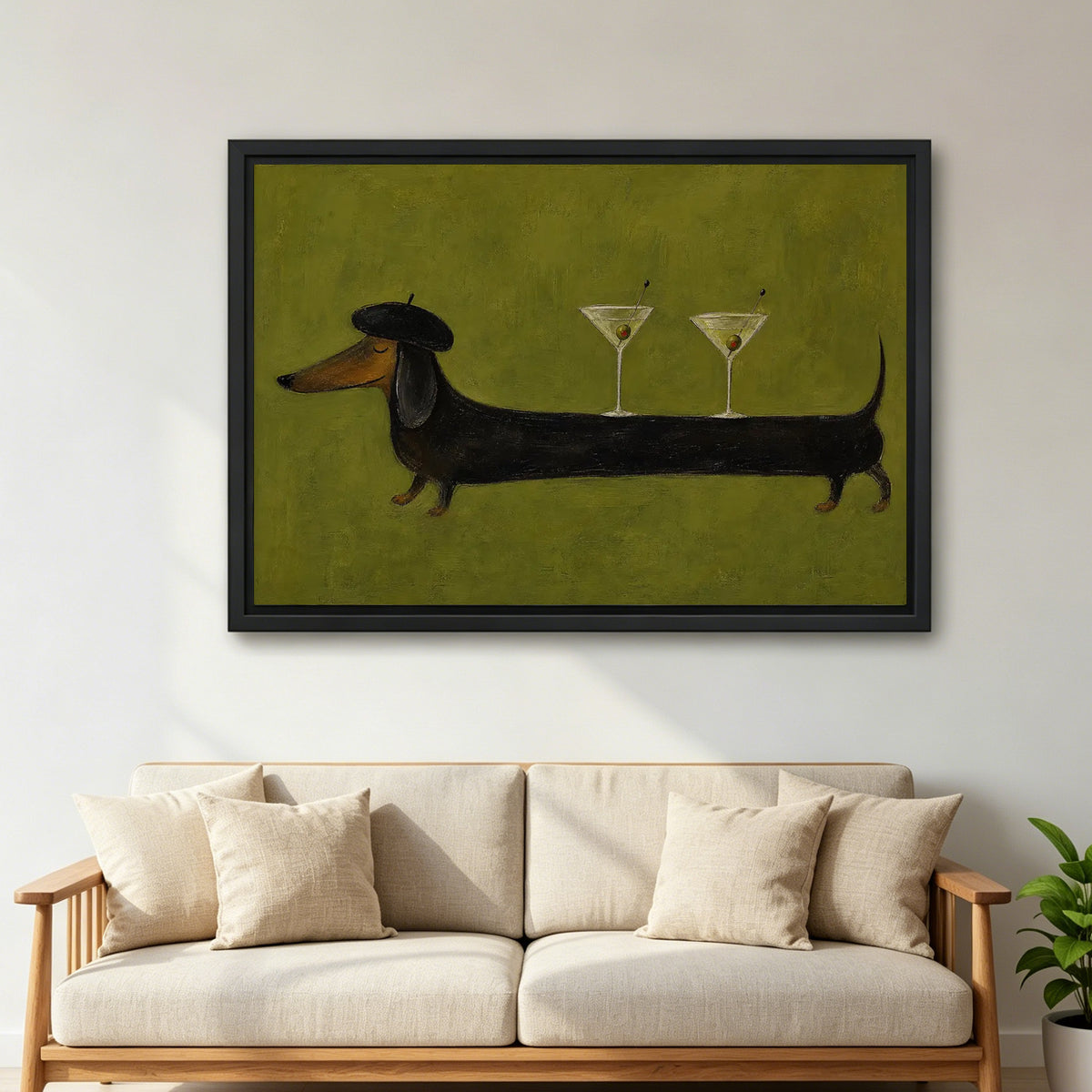Large framed dachshund martini canvas wall art with an olive green background above a cream living room sofa