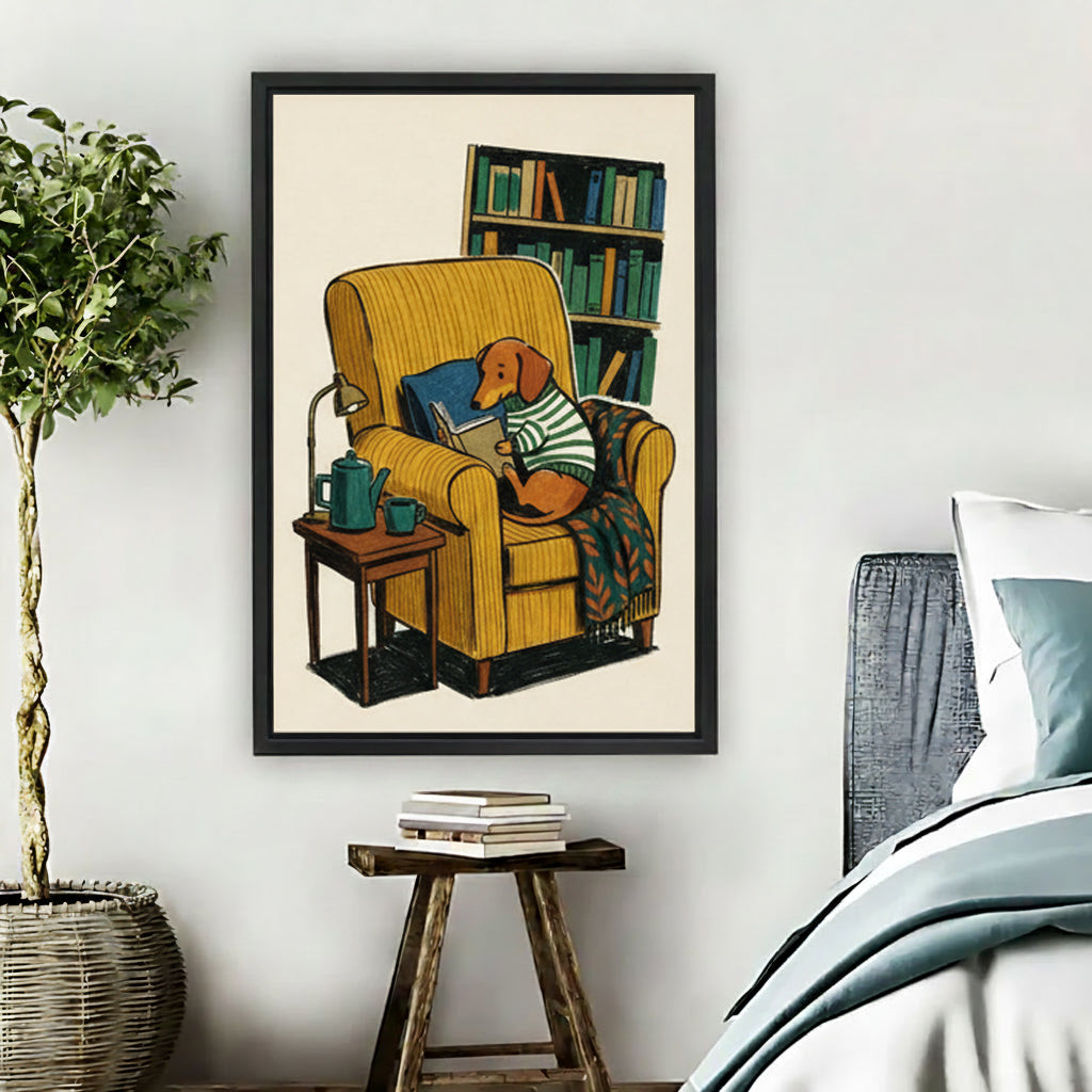 Vintage dachshund reading book in yellow armchair framed canvas wall art hung in cozy bedroom beside potted plant and nightstand