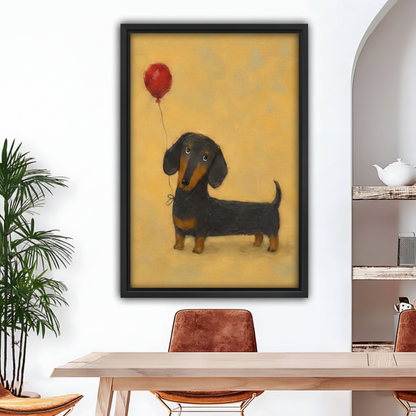 Black framed oil painting canvas of a sweet black and tan dachshund with soulful eyes holding a floating red balloon on a string tied to its chest, rendered in soft painterly brushstrokes on a warm amber and golden yellow background, hung above a wooden dining table
