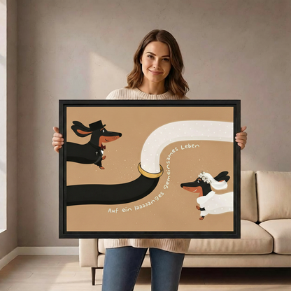 Woman holding whimsical dachshund bride and groom wedding framed canvas wall art size reference display