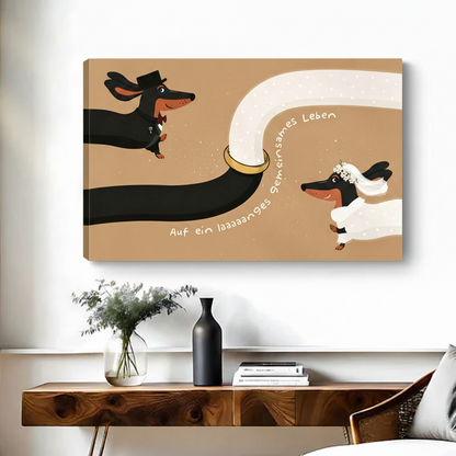 Whimsical dachshund bride and groom wedding gallery wrap canvas print above black console table with plants in modern entryway
