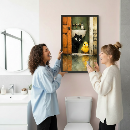 Funny cat and chick wall art print held by hand showing framed canvas size