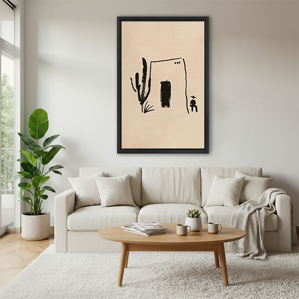 Gallery-wrap desert house and cactus canvas wall art with expressive black linework displayed beside plants and wooden tables.