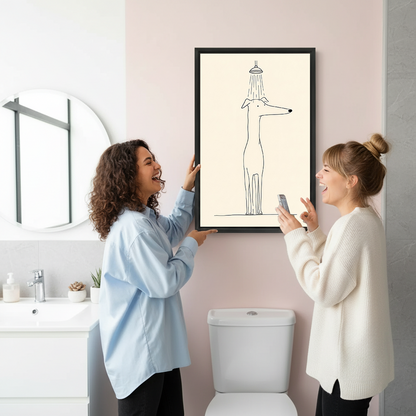 Dog in shower canvas wall art in a black frame beside two laughing women in a pink bathroom.