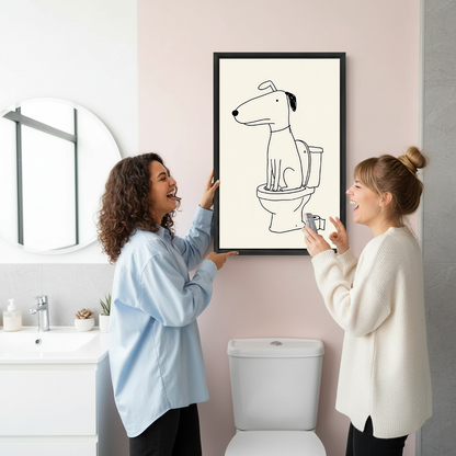 Funny dog on toilet canvas wall art in a black frame above a toilet against gray marble walls.