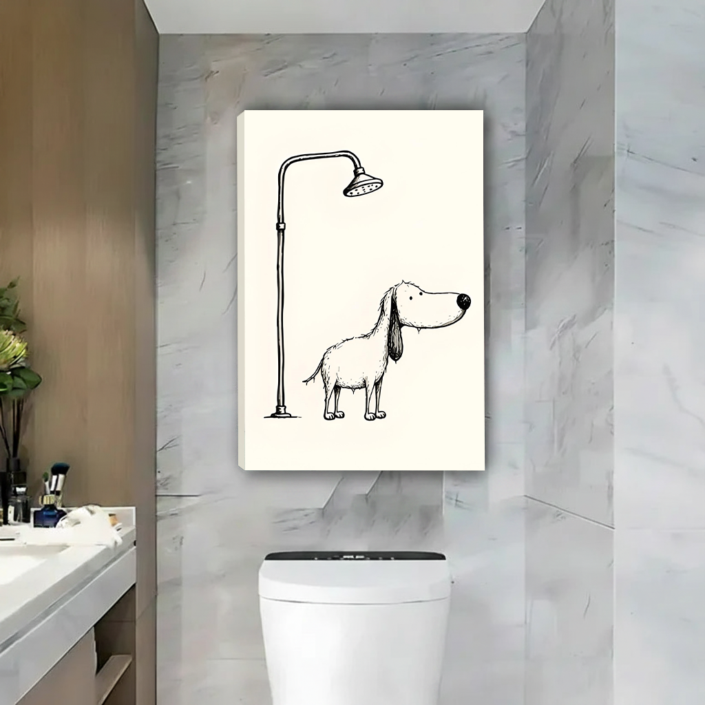 Black-framed dog shower canvas wall art displayed above a toilet beside a wooden vanity and round mirror.